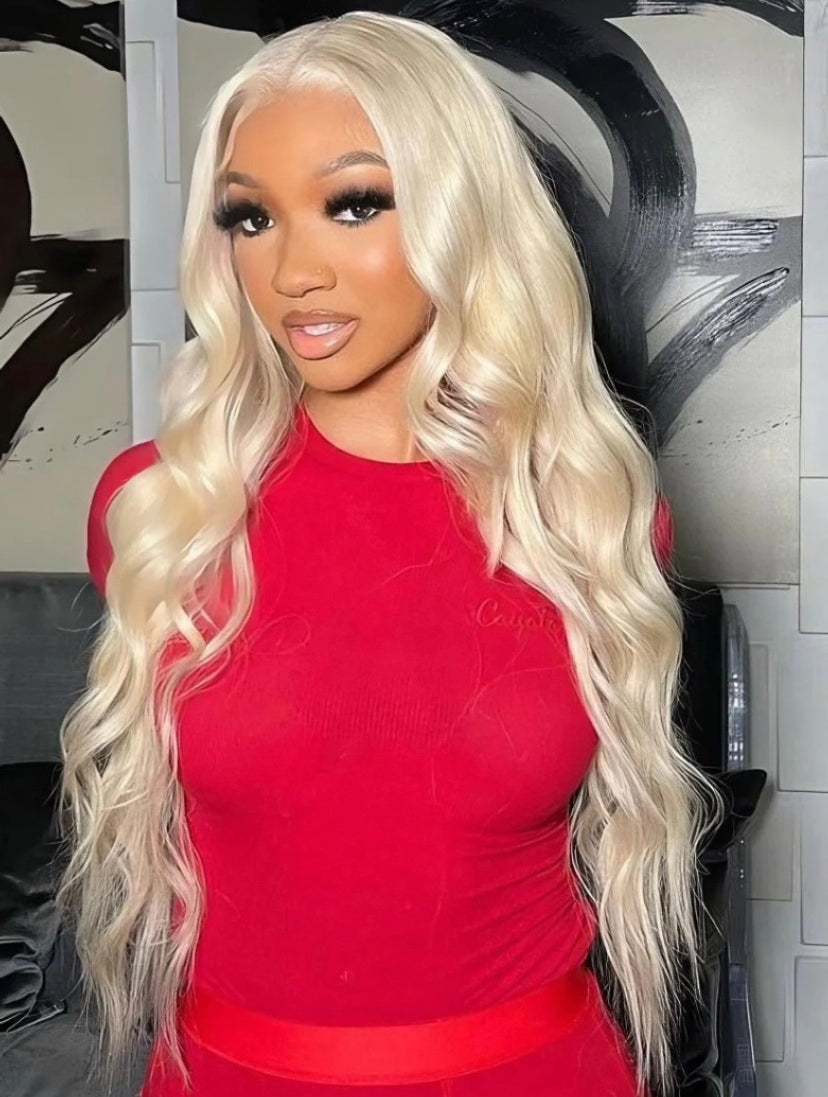 Lushlanes cheveux 3 pièces 613 blond vierge cheveux humains paquets corps
Cheveux ondulés