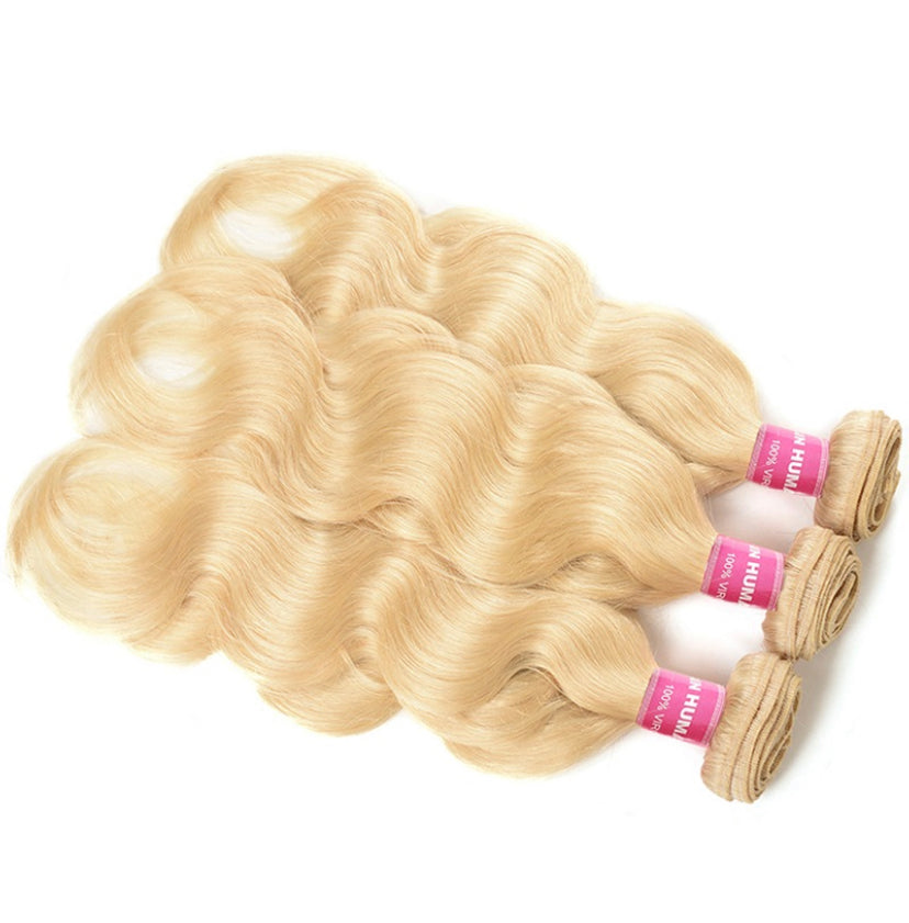 Lushlanes cheveux 3 pièces 613 blond vierge cheveux humains paquets corps
Cheveux ondulés